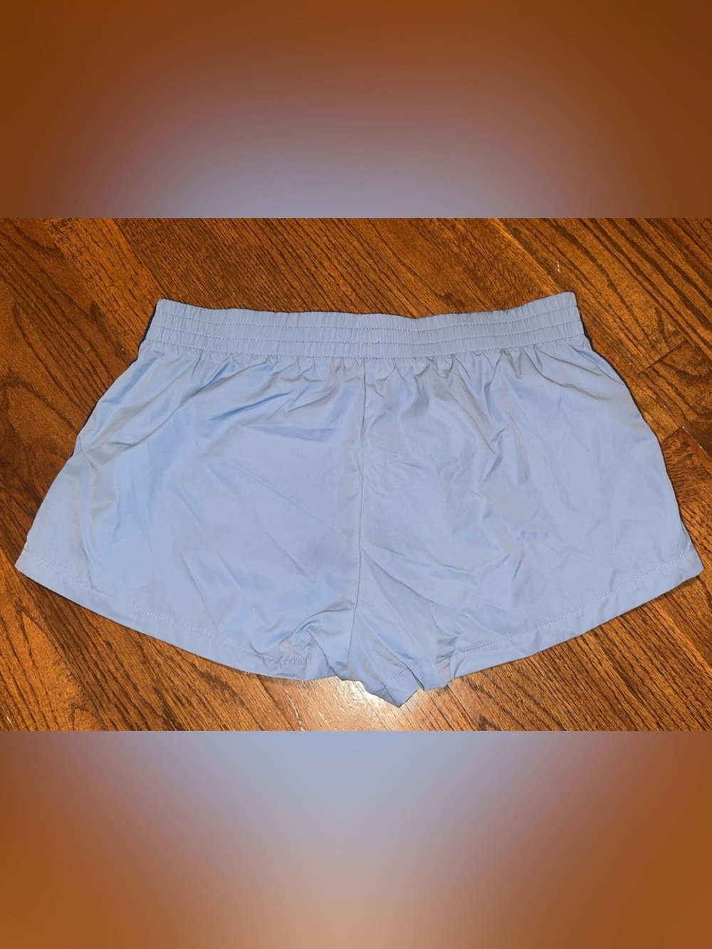 Edikted Light Blue Women’s Athletic Shorts with Navy Side Stripes - Picture 2 of 3